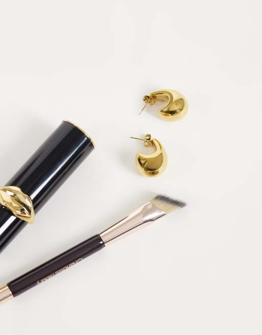 ASOS DESIGN waterproof stainless steel stud earrings with teardrop shape in gold tone, 2 of 3