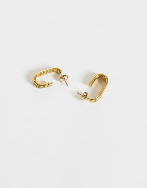 ASOS DESIGN waterproof stainless steel triple hoop earrings in gold tone, 3 of 5