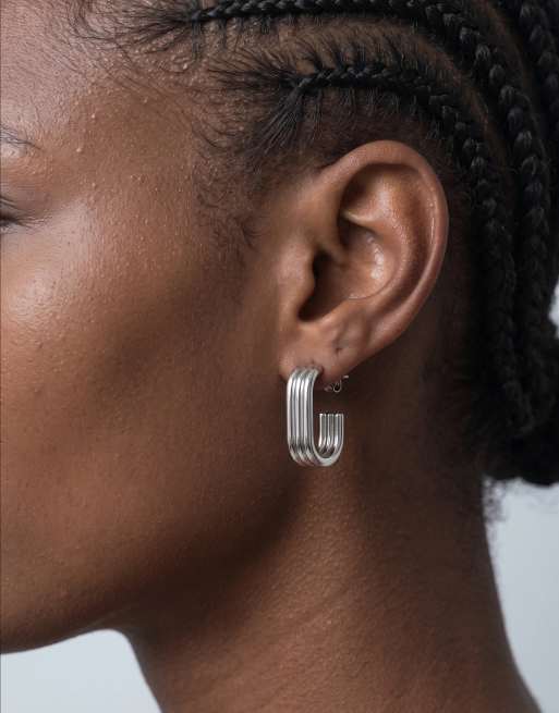 ASOS DESIGN waterproof stainless steel triple hoop earrings in silver tone, 2 of 5