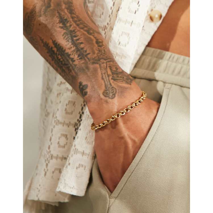 ASOS DESIGN waterproof stainless steel twist chain bracelet in gold tone ASOS