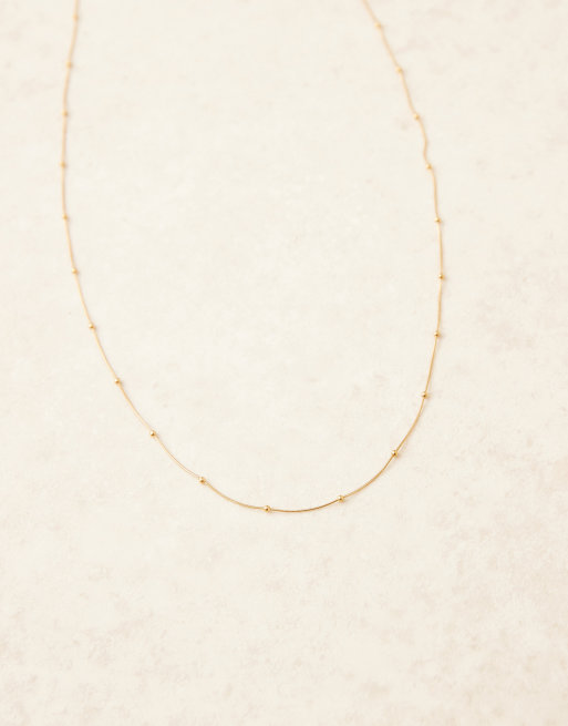 ASOS DESIGN waterproof stainless steel twisted belly chain in gold tone