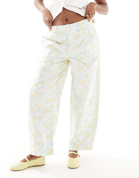 ASOS DESIGN – Wciągane spodnie barrel w sprany kwiatowy wzór - view 1