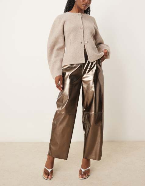 ASOS DESIGN faux leather pull on barrel trousers in brass