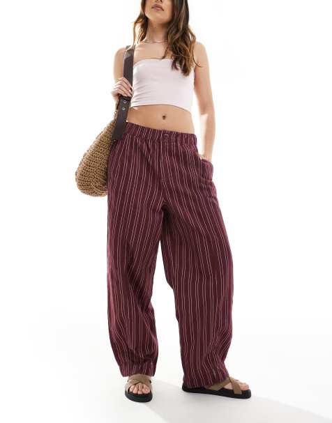 ASOS DESIGN – Wciągane spodnie baryłkowe w kolorze spranego bordo w paski - view 1