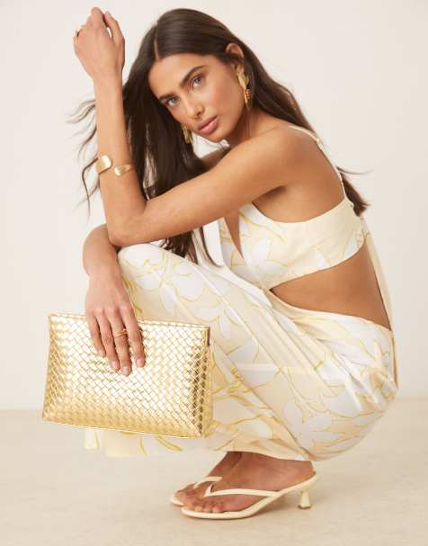 ASOS DESIGN weave zip top clutch bag in gold - view 1
