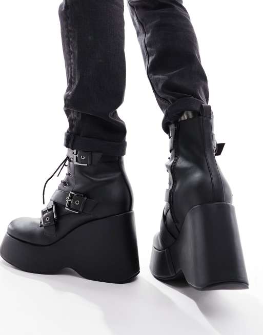 Black leather boots store with wedge heel