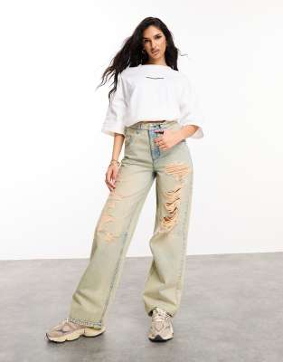 ASOS DESIGN - Weekend Collective - Baggy-Jeans in Acid-Waschung mit extremen Zierrissen-Bunt