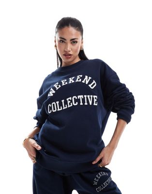 Asos Weekend Collective Asos Design Weekend Collective Oversized Sweatpants With Varsity Logo In Navy