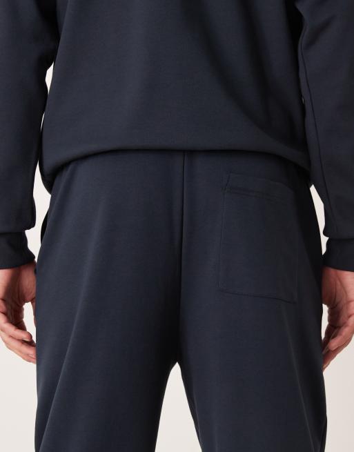 ASOS DESIGN – Weiche, schmal zulaufende Jogginghose in Marineblau, Kombiteil, 5 von 5