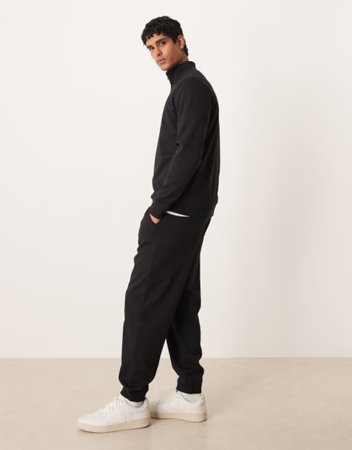 ASOS DESIGN – Weiche, schmal zulaufende Jogginghose in Schwarz, Kombiteil, 3 von 5