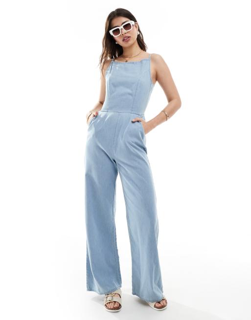 ASOS DESIGN Weicher Denim Jumpsuit in Mittelblau mit Bindeband hinten