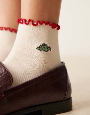 ASOS DESIGN - Weihnachtliche Socken in Cremeweiß mit Dinosaurier-Motiv