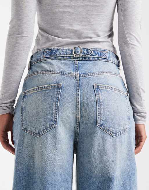  ASOS DESIGN – Weit geschnittene Jeans in blassblauer Vintage-Waschung mit hohem Bund und Zuglasche, 4 von 5