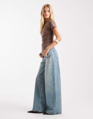 ASOS DESIGN - Weit geschnittene Jeans in Vintage-Waschung mit hohem Bund und Zuglasche-Blau