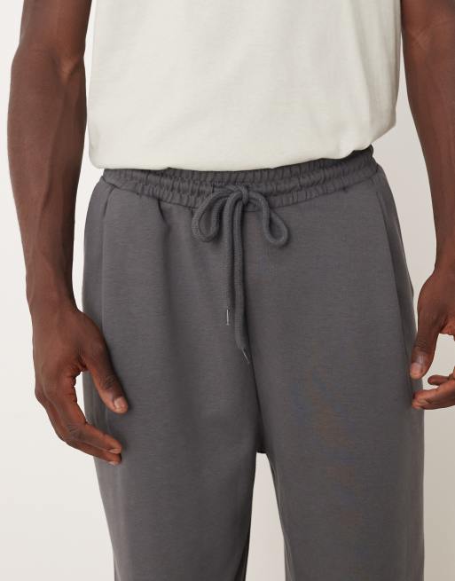 ASOS DESIGN – Weit geschnittene Jogginghose in Dunkelgrau mit Bundfalten, 5 von 5