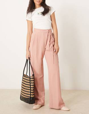 ASOS DESIGN - Weit geschnittene Leinenhose in Apricot mit Bindedetail vorne-Rosa