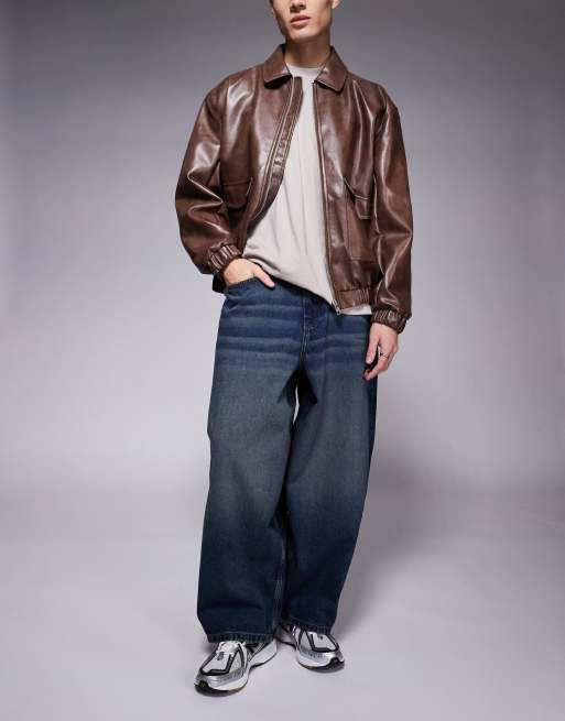 ASOS DESIGN – Weit geschnittene Oversize-Jeans in verwaschenem Dunkelblau mit Vintage-Farbstich 