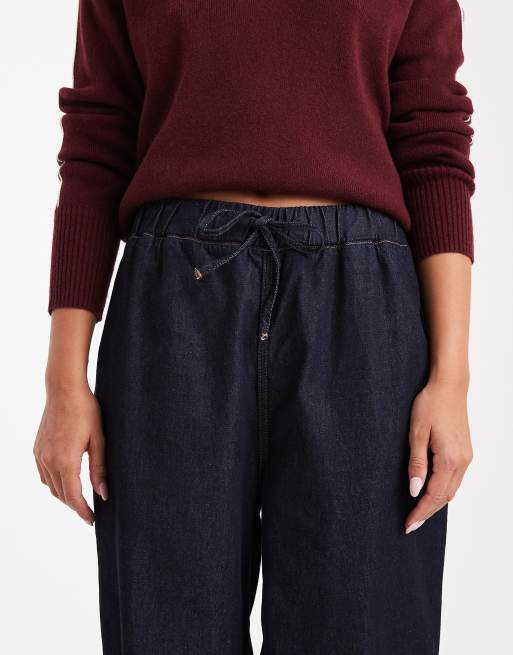 ASOS DESIGN – Weit geschnittene Schlupf-Jeans im Jogginghosen-Design in Rinse-Waschung, 3 von 5