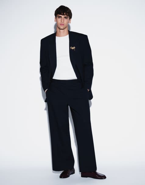 ASOS DESIGN weite Anzughose in Marineblau mit metallischem Nadelstreifen - view 1