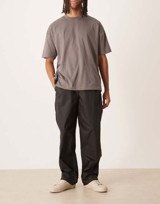 ASOS DESIGN – Weite Hose aus Nylon in Schwarz mit Gesäßtaschen-Detail, 2 von 5