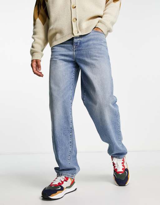 ASOS DESIGN – Weite Jeans in gefärbtem verwaschenem Mittelblau