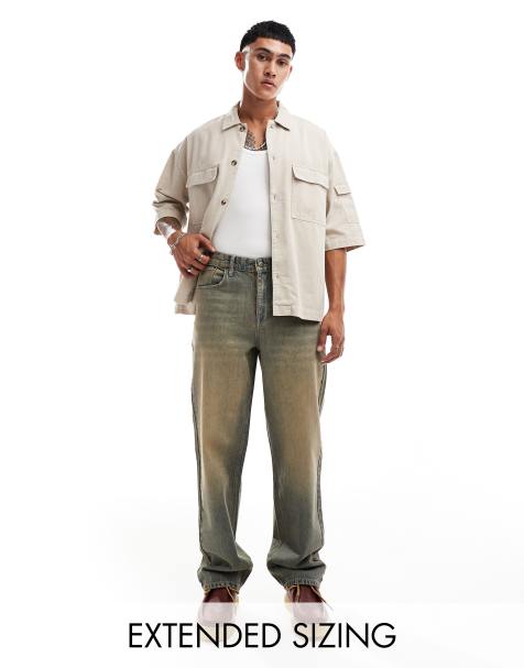 ASOS DESIGN – Weite Jeans in verwaschenem Mittelblau mit Farbstich in Vintage-Braun - view 1
