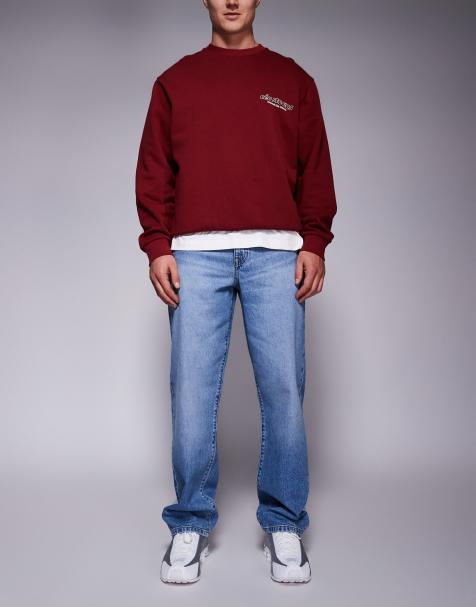 ASOS DESIGN – Weite Jeans in verwaschenem Mittelblau - view 1
