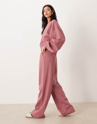 ASOS DESIGN - Weite Jogginghose in Rosé mit weicher Innenseite-Rosa