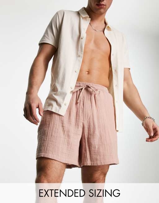 ASOS DESIGN – Weite, kürzere Shorts in strukturiertem Rosa