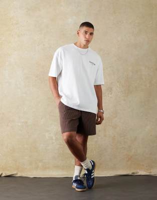 ASOS DESIGN – Weite, plissierte Shorts in Braun, Kombiteil - view 1