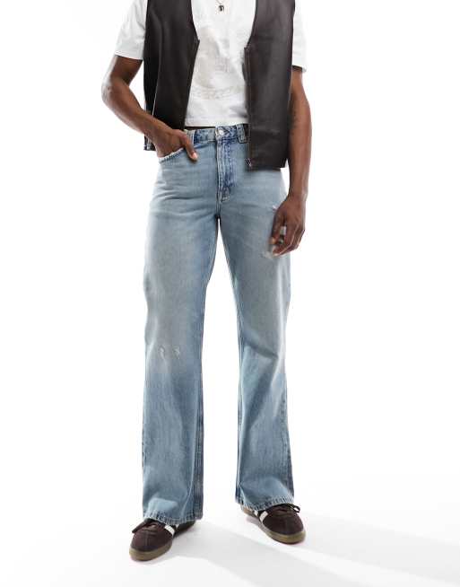 ASOS DESIGN – Weite Schlagjeans in hellblauer Waschung
