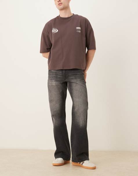 ASOS DESIGN – Weite Schlagjeans in verwaschenem Vintage-Schwarz - view 1