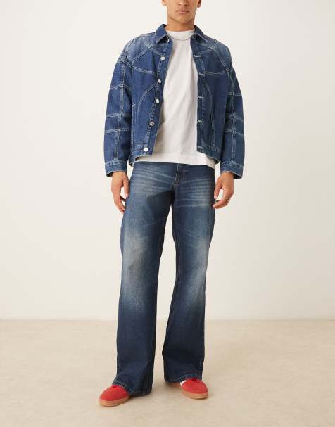 ASOS DESIGN – Weite Schlagjeans mit Tönung in verwaschenem Dunkelblau - view 1