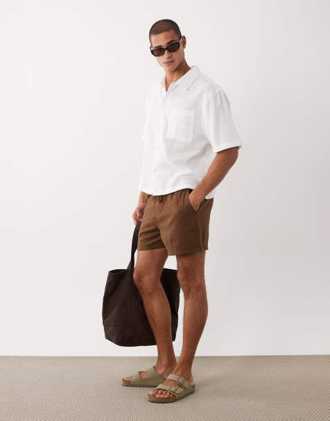 ASOS DESIGN – Weite, strukturierte, kürzere Shorts in Braun mit elastischem Bund - view 1