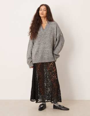 ASOS DESIGN - Weiter Maxirock aus Spitze in Schwarz