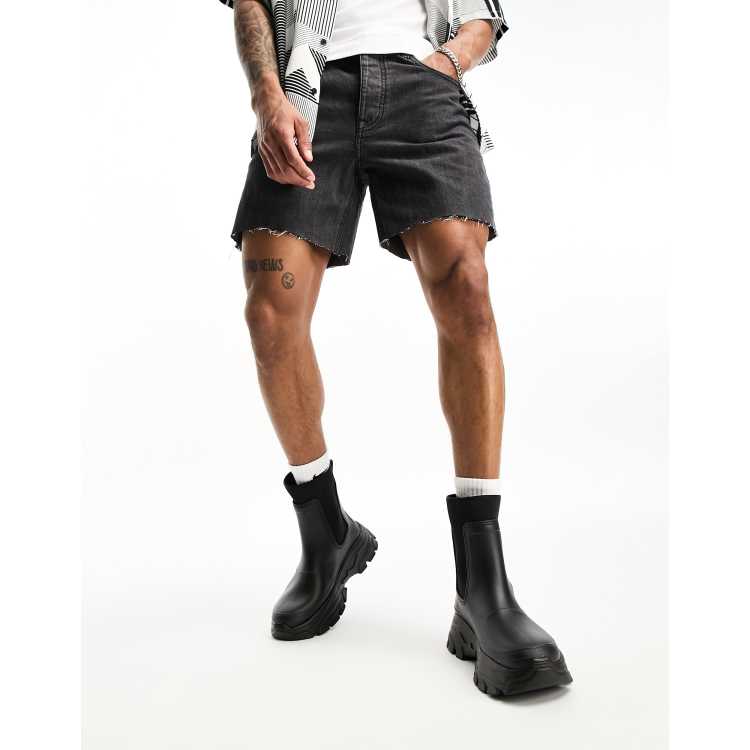 ASOS DESIGN wellington boots with tape detail in black