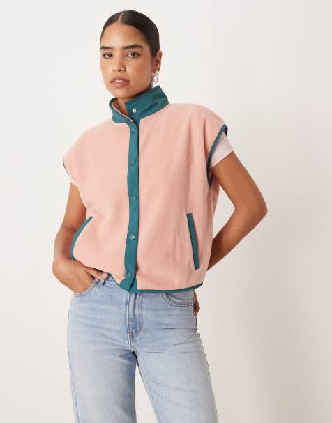 ASOS DESIGN – Weste aus Polarfleece in Rosa mit kontrastierenden Nylondetails in Grün - view 1