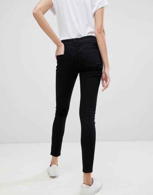 ASOS DESIGN – Whitby – Enge Jeans in reinem Schwarz mit niedrigem Bund, 2 von 4