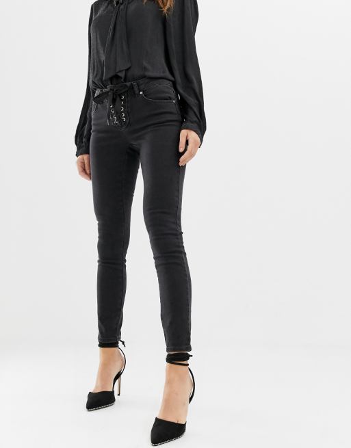 ASOS DESIGN whitby low rise 'skinny' jeans in washed black with lace up front detail | ASOS