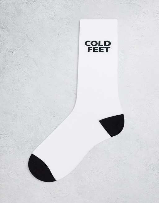 ASOS DESIGN white socks with cold feet slogan