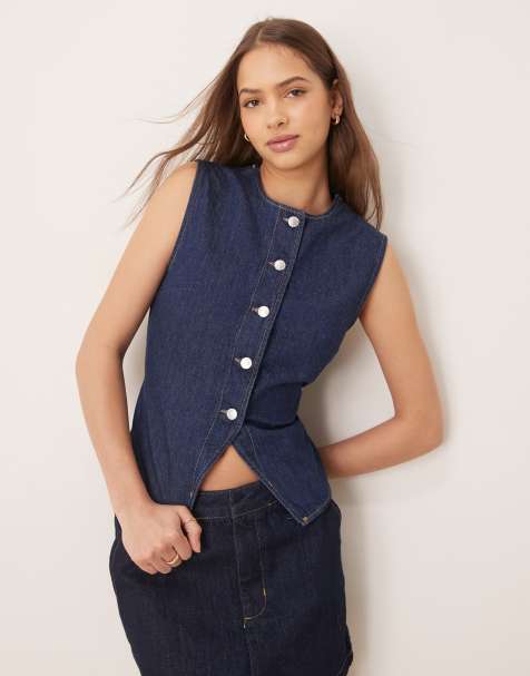 ASOS DESIGN – Wiązana na plecach kamizelka jeansowa w kolorze indygo z efektem sprania - view 1