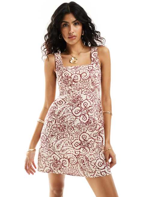 ASOS DESIGN – Wiązana na plecach letnia sukienka lniana mini z dekoltem karo we wzór paisley