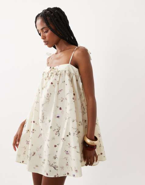 ASOS DESIGN – Wiązana z przodu bawełniana sukienka w stylu babydoll w kolorze kości słoniowej w rozmyty drobny wzór - view 1