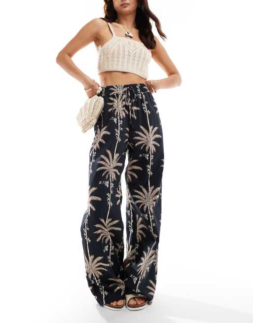 ASOS DESIGN – Wiązane w talii spodnie z szerokimi nogawkami z domieszką lnu we wzór w palmy