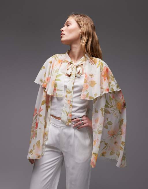 ASOS DESIGN – Wiązany z przodu szyfonowy top o kroju peleryny z falbanką w kwiatowy wzór