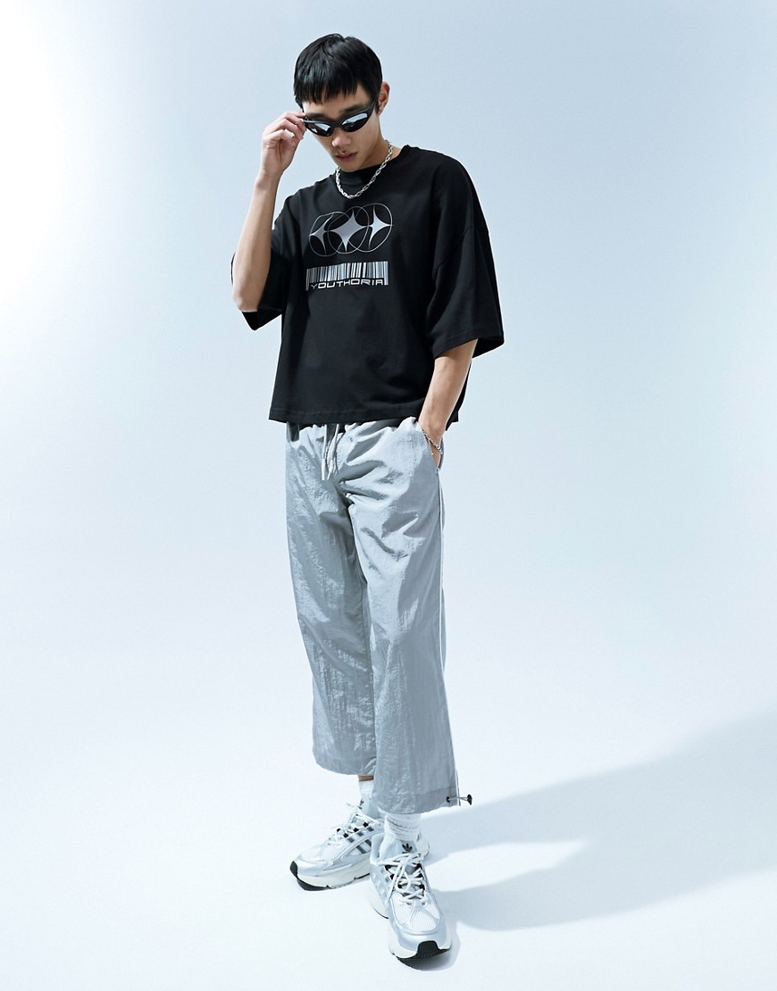 wide awkward length nylon pants with toggle detail in silver