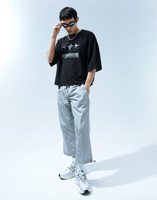 ASOS DESIGN ASOS DESIGN wide awkward length nylon trouser with toggle detail in silver