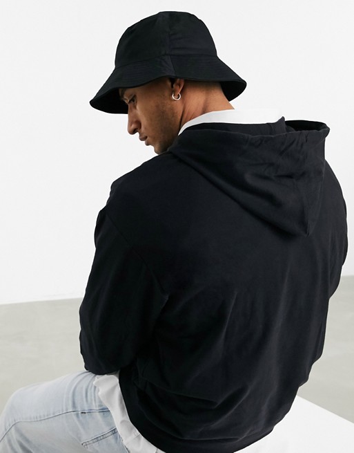 ASOS DESIGN wide brim bucket hat in black cotton