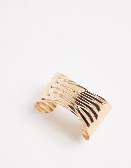 ASOS DESIGN wide cuff bangle with ridged texture in gold tone | ASOS