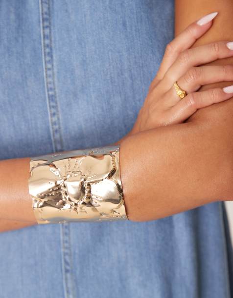 ASOS DESIGN wide cuff bracelet with floral design in gold tone - view 1
